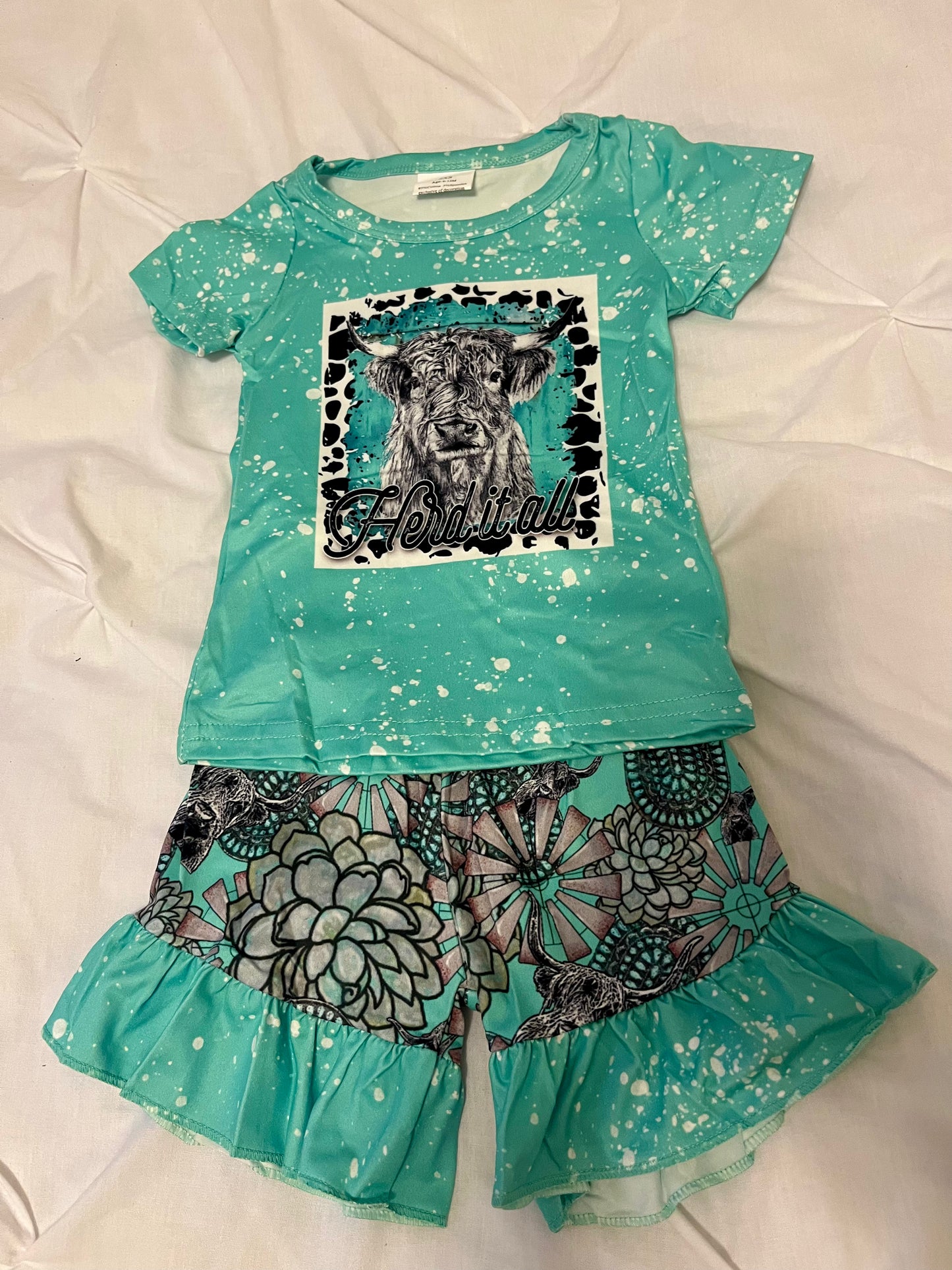 Herd it all- turquoise Highlander
